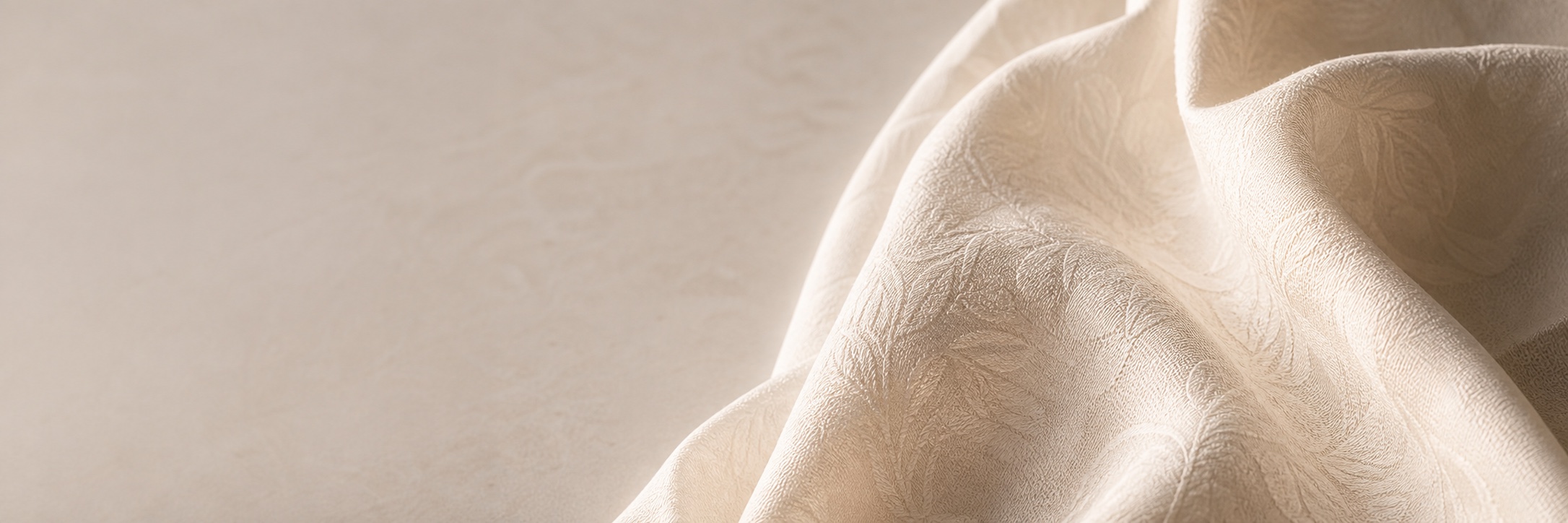Soft ivory fabric in warm natural light